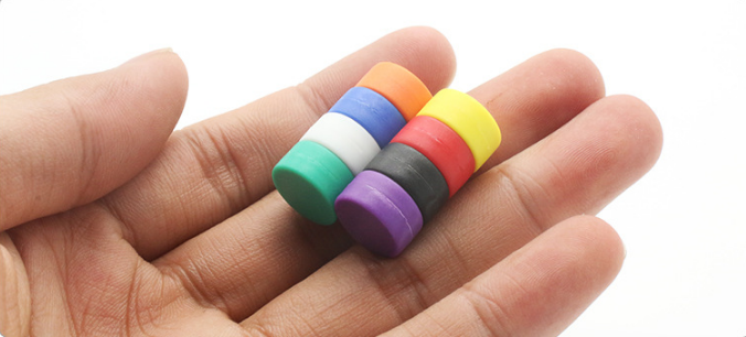 Color encapsulated plastic coated magnets