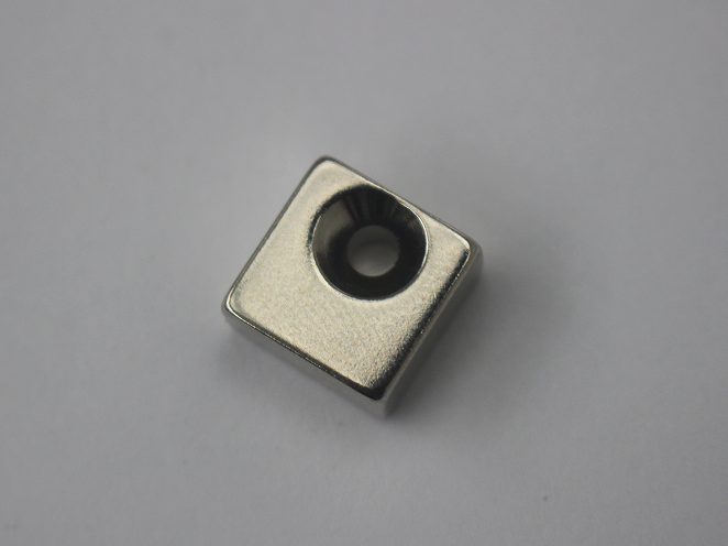 square countersunk magnet with an off-center hole